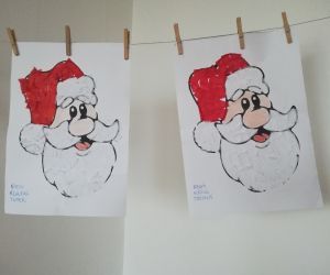 Portret Mikołaja wykonany przez starszych przedszkolaków - praca grupowa.