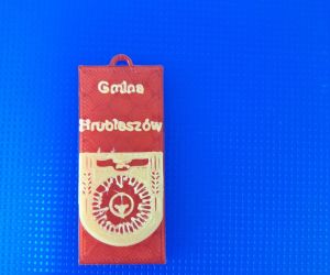 Breloczek z logo gminy Hrubieszów powstały w procesie druku 3D
